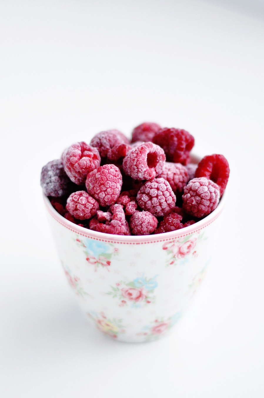 raspberries in a cup